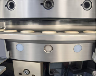 damping mechanism tablet press